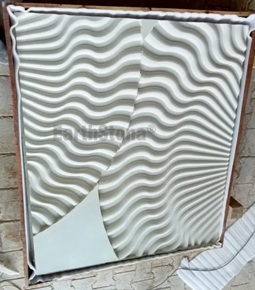 Luxury ripple stone wall carving design with circular wave pattern and spotlight by EarthStona